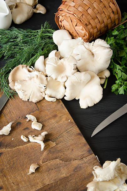 istock pleurotus black wooden table wicker 537831012