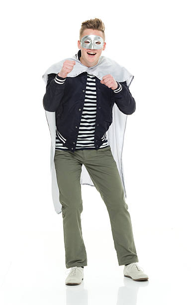 istock Smiling superhero in fighting stance 537831252