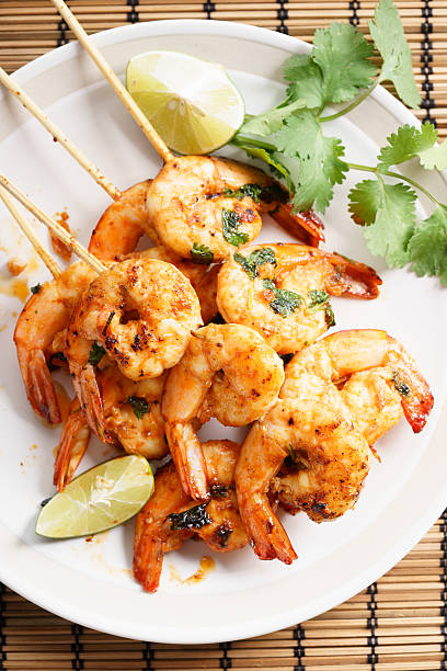 istock grilled shrimp kababs with sriracha and lime 537835048