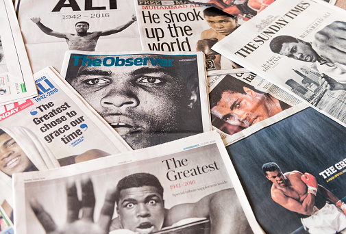 Edinburgh, UK - June 5, 2016: The front pages of a collection of British newspapers, featuring images taken during the career of former world heavyweight champion boxer Muhammad Ali, following his death on 3rd June 2016.