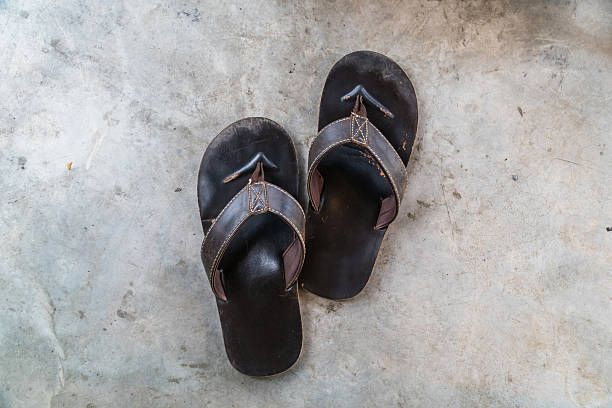 istock old slipper or sandal on cement floor 537838200