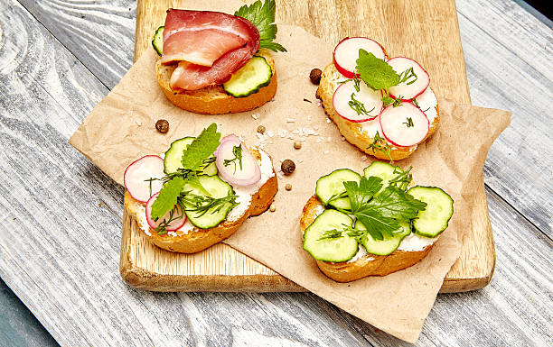 istock sandwiches with ricotta, cucumber, radishes, bacon 537838938