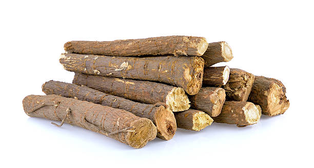 istock Liquorice roots isolated on white background 537839232