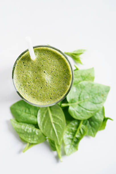 istock glass of fresh green spinach and kale healthy smoothie 537839430
