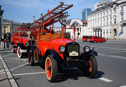 Warsaw, Poland - June 4th, 2016: Classic Chevrolet firetruck stopped on the street before the parade during the Fire Brigade Day. This truck was built in 1922, and now is one of the oldest fire trucks in Poland.