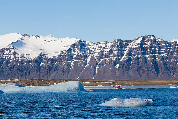 istock Jakulsalon lagoon with mountain snow covered 537845606