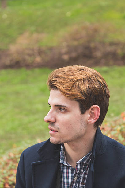 istock Young man posing in the city streets 537845998