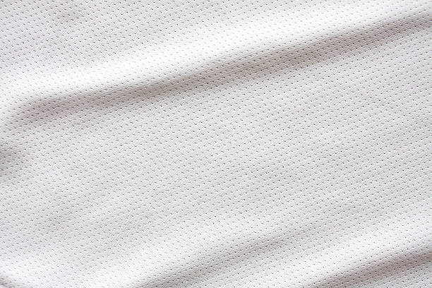 White sports clothing fabric jersey White sports clothing fabric jersey texture sports jersey stock pictures, royalty-free photos & images
