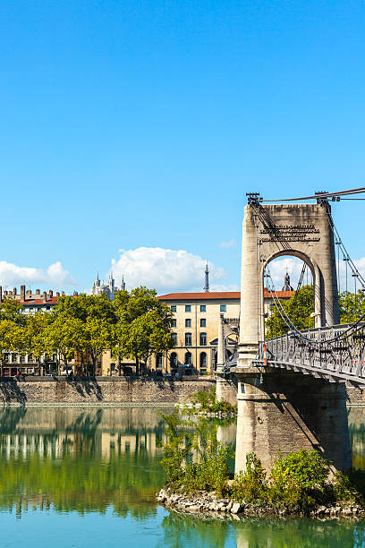 istock Old Passerelle du College bridge over Rhone river in Lyon 537847000
