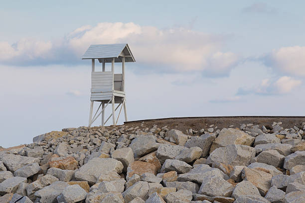 istock Lifeguard station over rocky road 537849124