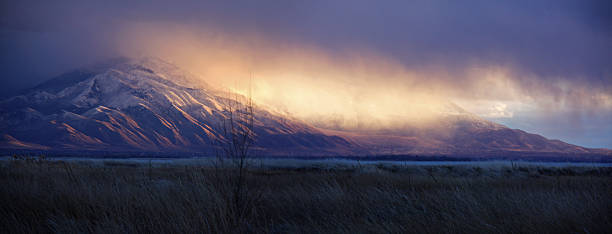 Snowstorm at Sunset, Utah Lake stock photo