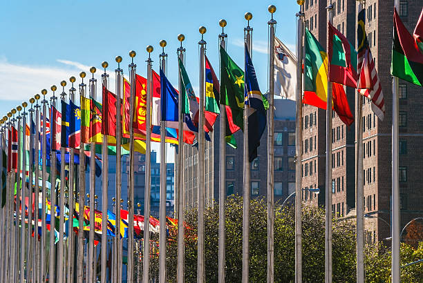 Flags of Nations Flags from all countries outside of the UN building in Manhattan. upper midtown manhattan stock pictures, royalty-free photos & images