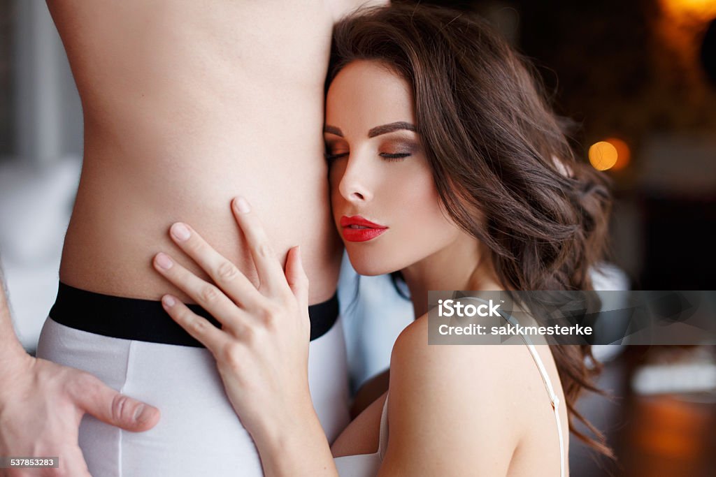 Sexy woman with young lover Sexy woman with young lover closeup, indoor portrait, desire Human Sexual Behavior Stock Photo