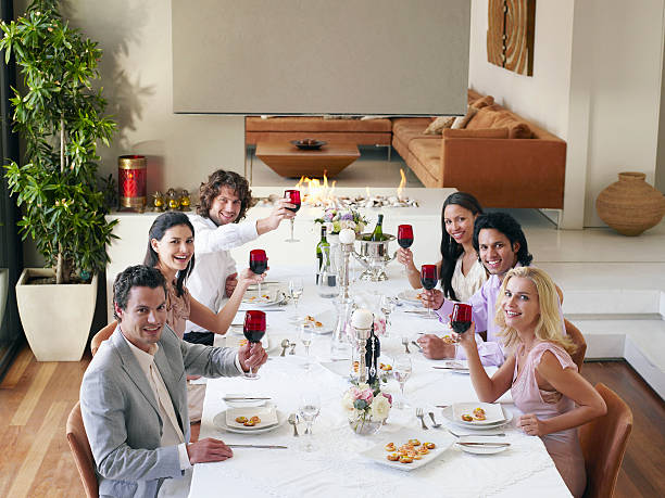 istock Friends Toasting Wineglasses At Dinner Party 537854055