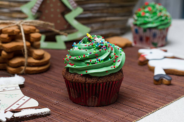 istock Christmas Treats. Cakes, cupcakes, confection. Light background 537855325