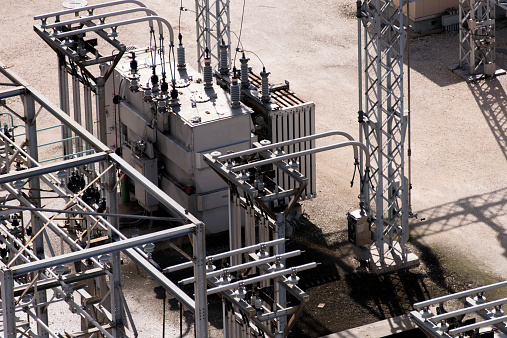 electrical power substation with transformers and insulators