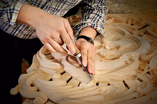 istock skill of carving wood to make ornamental objects 537860948