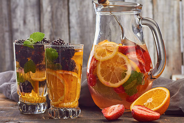 istock Summer fruit drink on wooden background 537864848