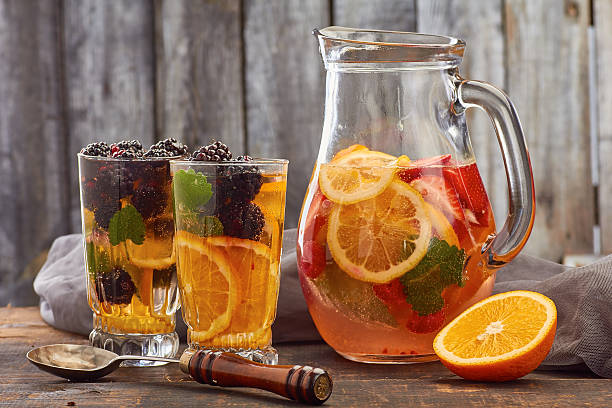 Summer fruit drink on wooden background