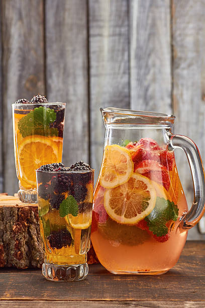 istock Summer fruit drink on wooden background 537865126