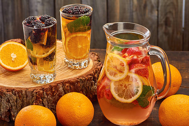 istock Summer fruit drink on wooden background 537865272