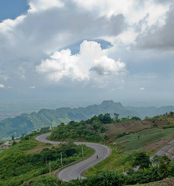 istock mountain road in a morning mist, thailand 537866795