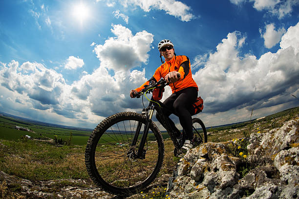 istock Young man is riding bicycle outside. Healthy Lifestyle. 537867188