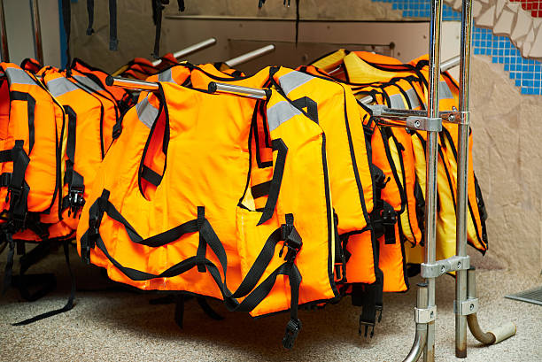 istock Life jacket hanging on hanger in store 537868015
