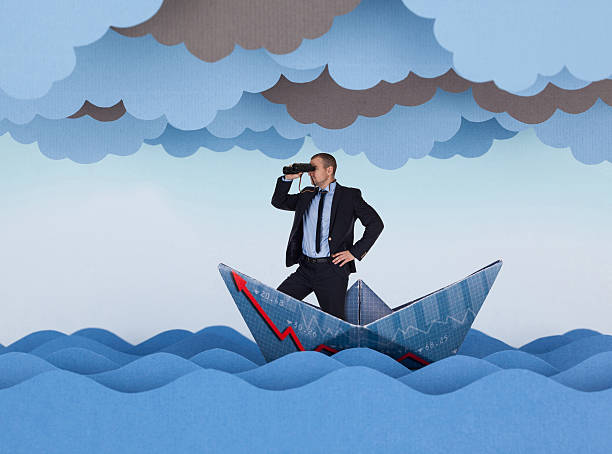 Businessman looking for new opportunities Businessman looking for new opportunities and sailing in stormy papers sea. Paper waves, clouds and boat. making money origami stock pictures, royalty-free photos & images