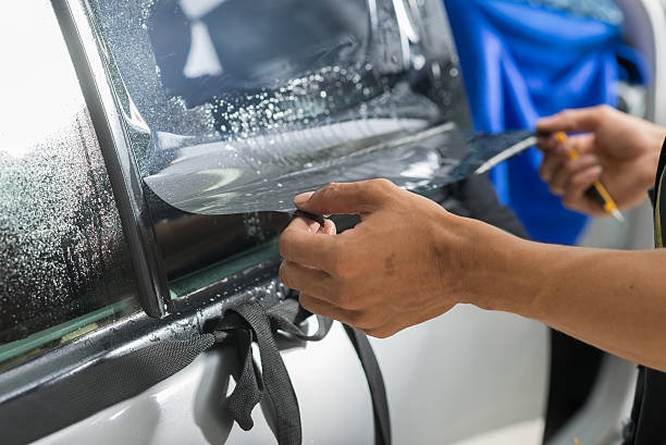 istock Car window tinting series : Installing car window tint 537869002