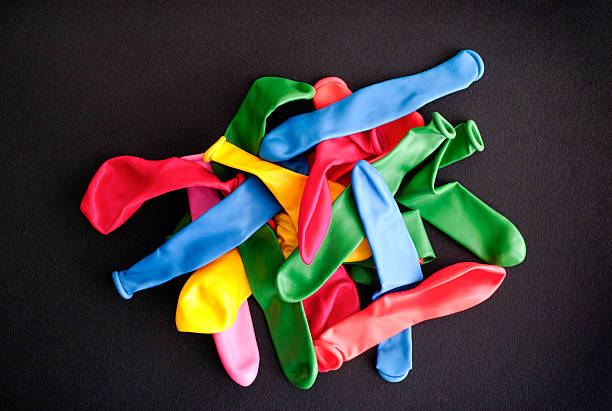 istock Pile of colorful uninflated balloons 537869916