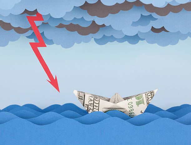 istock Dollar boat in storm. Paper waves and clouds 537869944