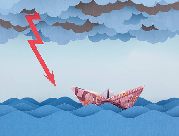 istock Euro boat in storm. Paper waves and clouds 537870618