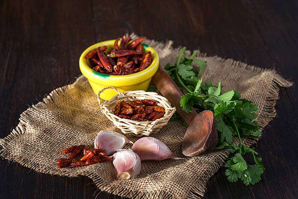 istock dry pepper,garlic segments and parsley on napkin 537870752