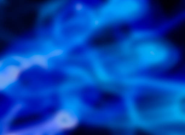 istock blue blurred curvy smoke lights as dark background 537871428