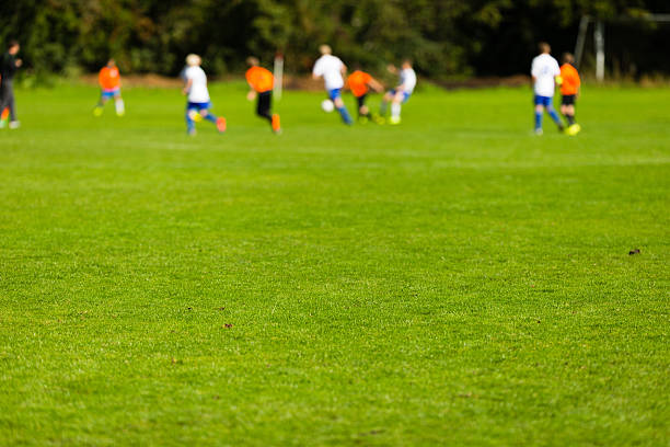 istock Young soccer players on soccer field 537871588