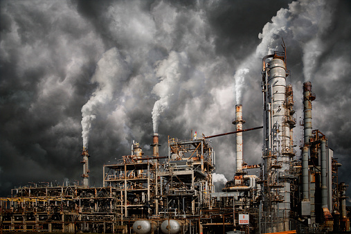 Industrial plant emitting fumes and creating pollution