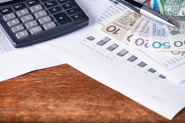 istock Calculator money statistics papers pen business concept 537873502