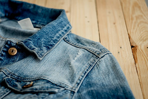istock Jeans. Jeans on a wooden floor 537874586