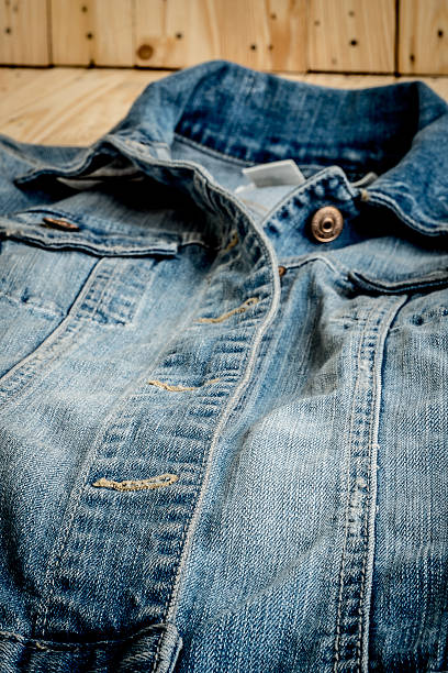 istock Jeans. Jeans on a wooden floor 537874880