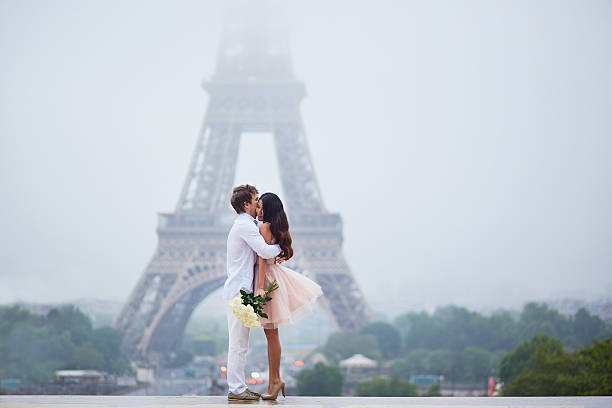 istock Beautiful romantic couple near the Eiffel tower in Paris 537874958