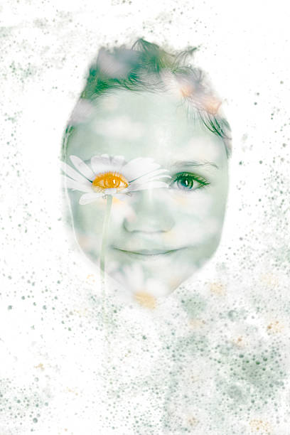 istock little blond girl looks through bath foam double exposure 537875364