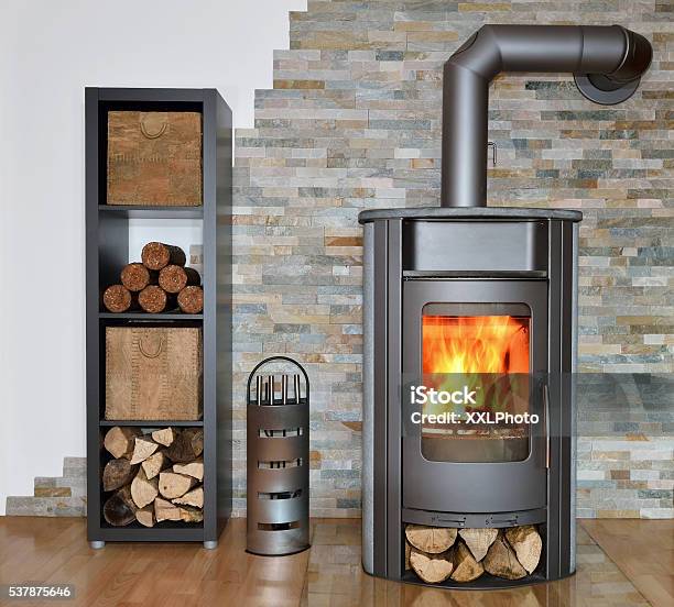 Wood Fired Stove While Burning Stock Photo - Download Image Now - Wood Burning Stove, Fireplace, Wood - Material