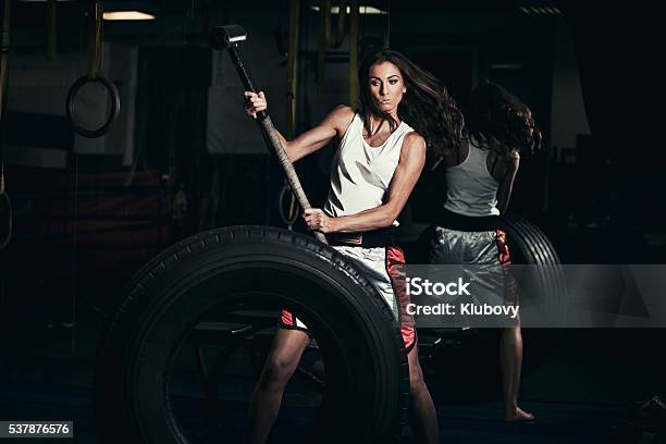 Young Strong Woman Cross Training Stock Photo - Download Image Now - Hammer, Women, One Woman Only