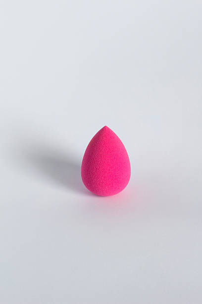 istock Pink beauty blender on a white background 537878022