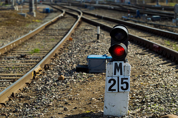 istock Railway semaphore against the background tracks and locomotive 537878796