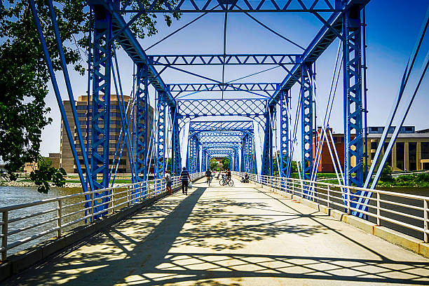 Pedestrian bridge over the Grand River in Grand Rapids MI stock photo