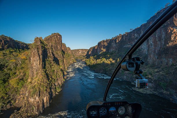 istock Aerial view from helicopter of sunlit gorge 537882020