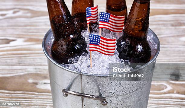Holiday Usa Flags And Bucket Of Ice Cold Beer Stock Photo - Download Image Now - Beer - Alcohol, USA, Circa 4th Century
