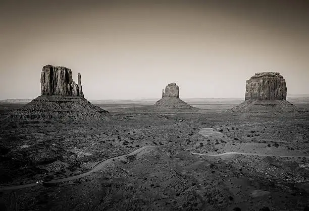 The Mittens from Monument valley in Arizona and Utah.  A stunnind desert landscape in grayscale.